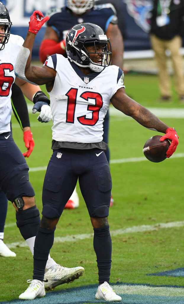 Brandin Cooks Houston Texans in action on football field vibrant team colors sports wallpaper