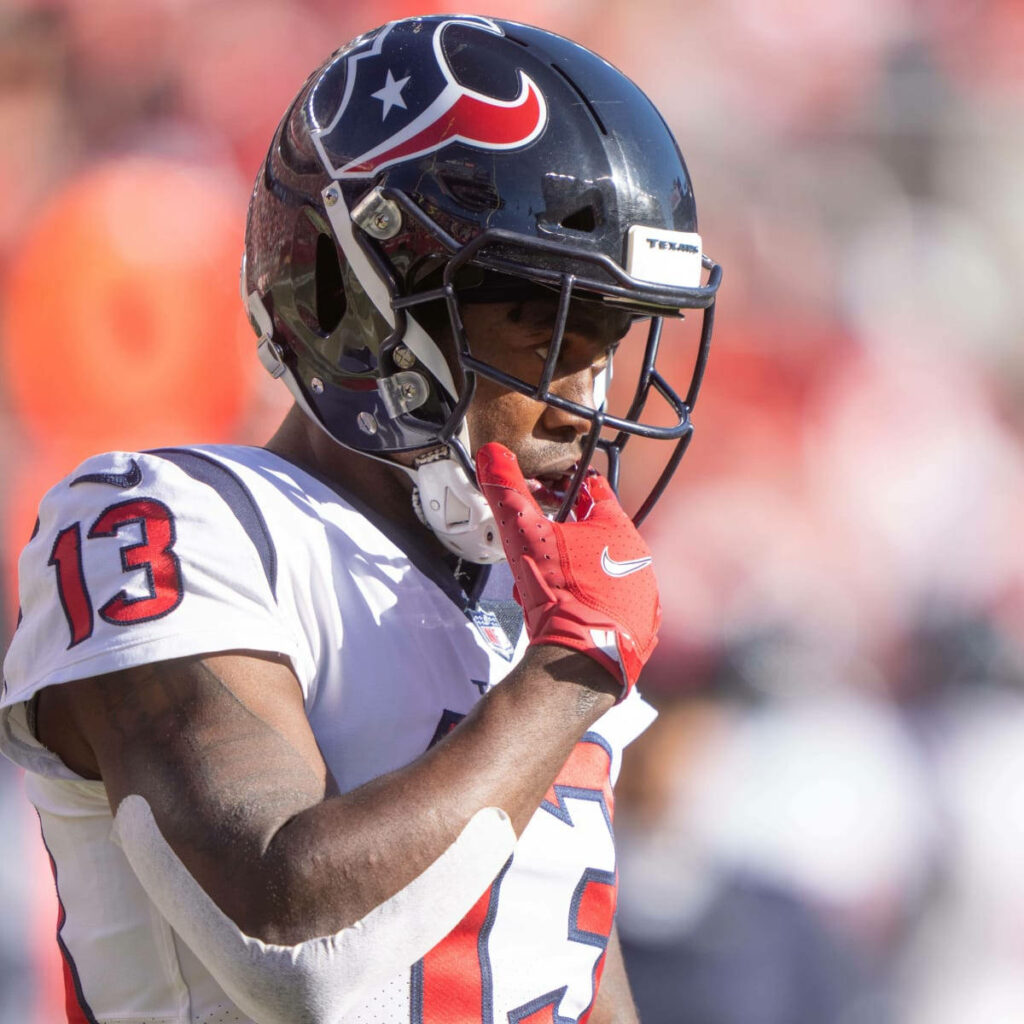 Brandin Cooks Houston Texans WR in action wearing uniform touching mouthpiece intense game wallpaper