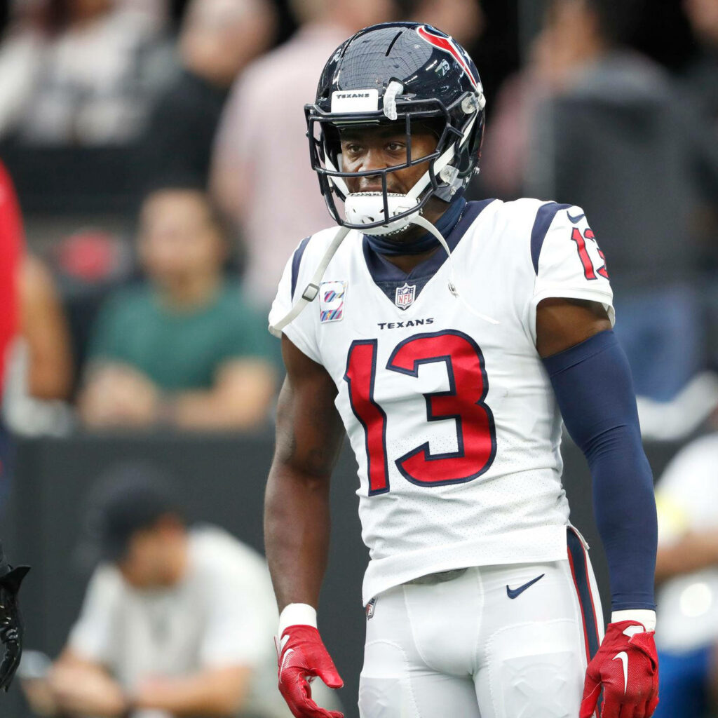 Brandin Cooks Houston Texans wallpaper in full uniform focused intense football game background
