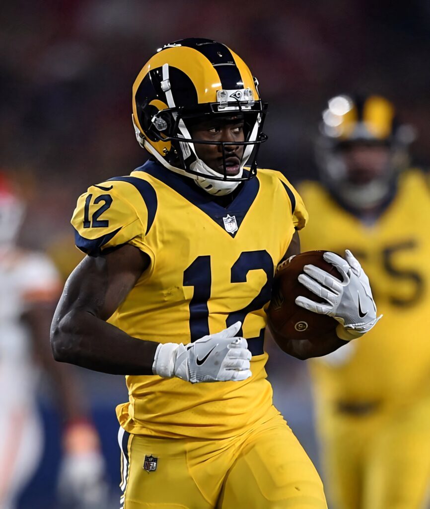 Los Angeles Rams Brandin Cooks running with ball in yellow blue uniform high-speed action wallpaper