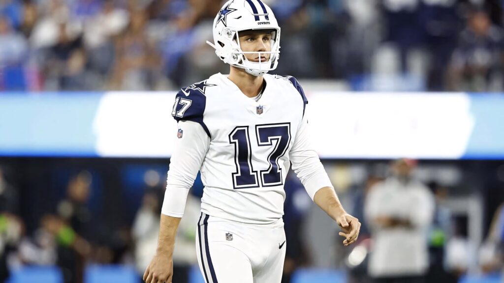 Brandon Aubrey Dallas Cowboys kicker in white uniform dynamic NFL action stadium wallpaper