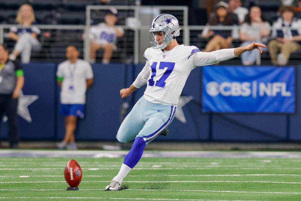 Dallas Cowboys kicker Brandon Aubrey number 17 action shot mid-field NFL vibrant team colors wallpaper