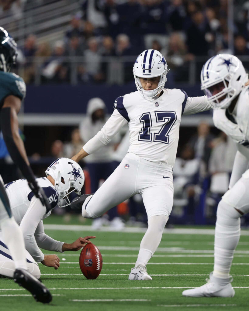 Brandon Aubrey Dallas Cowboys kicker mid-kick NFL game action dynamic sports wallpaper background