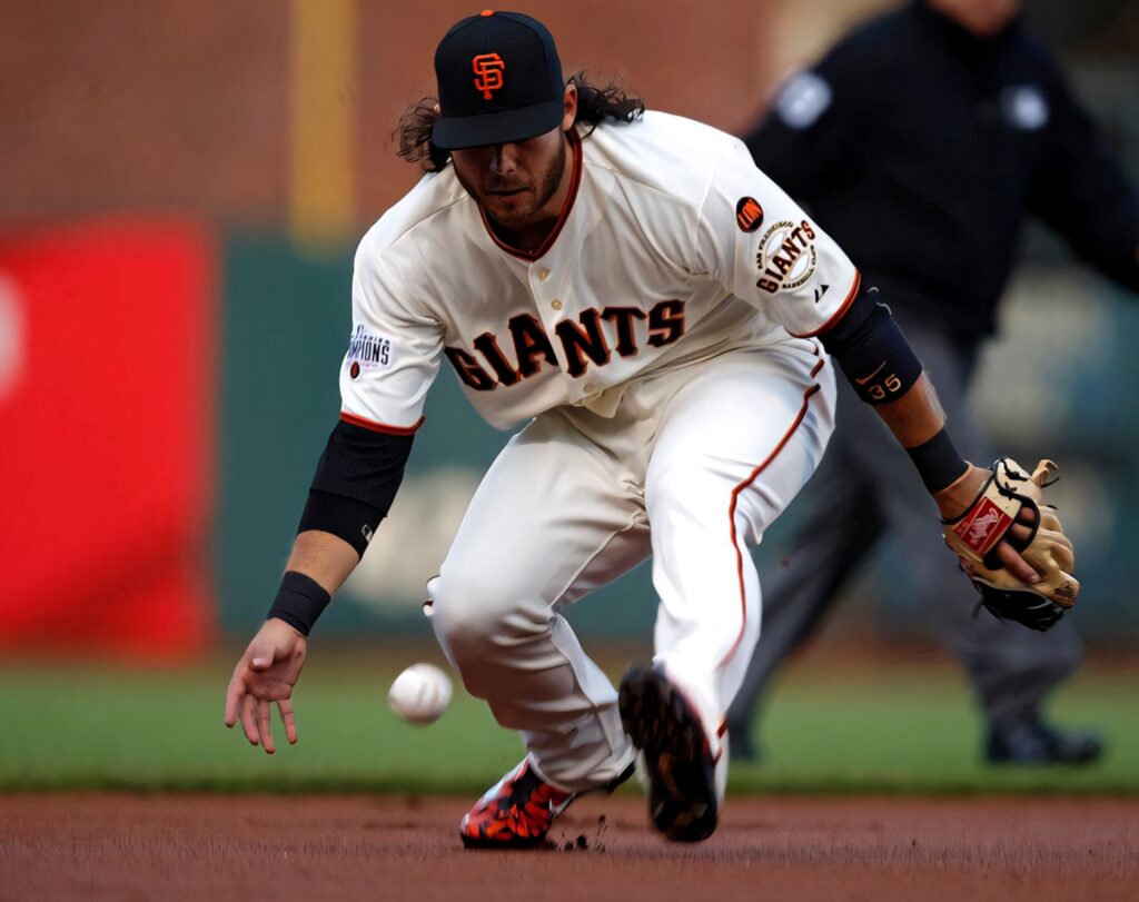 Brandon Crawford fielding ground ball intense action San Francisco Giants baseball stadium background Wallpaper