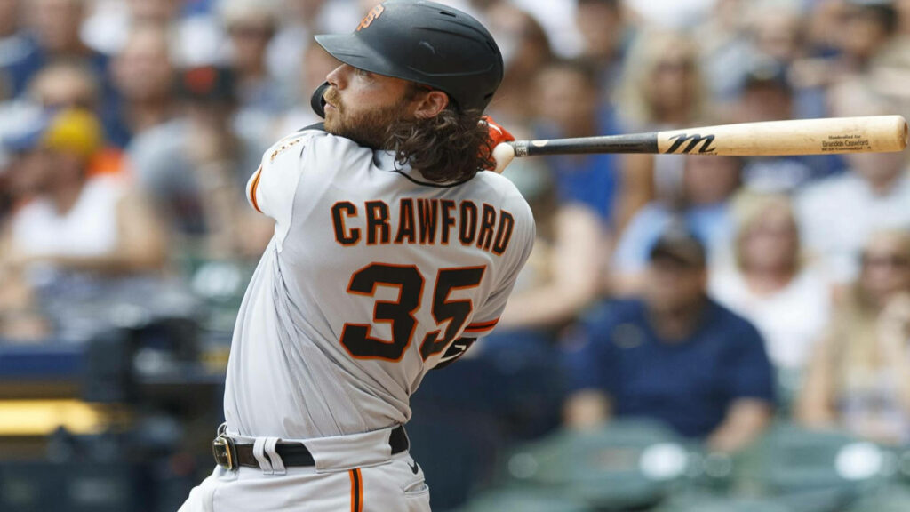 Brandon Crawford mid-swing San Francisco Giants wallpaper high-resolution vibrant stadium
