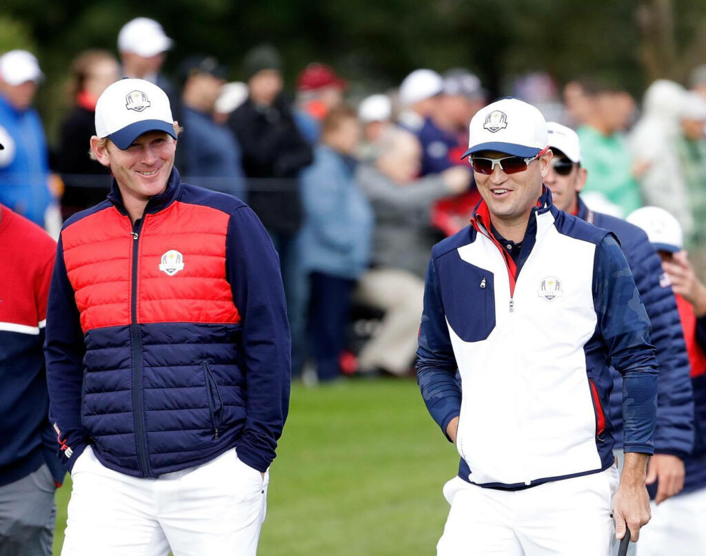 Brandt Snedeker walking golf course hands pockets red blue jacket white hat tournament crowd wallpaper