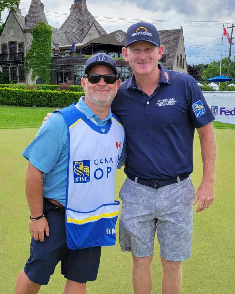Brandt Snedeker and Canada Open staff on lush golf course wearing RBC Wyndham Rewards apparel Wallpaper