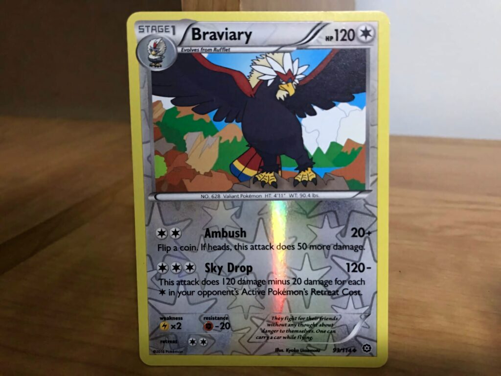Braviary Pokémon card wallpaper featuring dynamic Flying-type attacks Ambush and Sky Drop vibrant colors