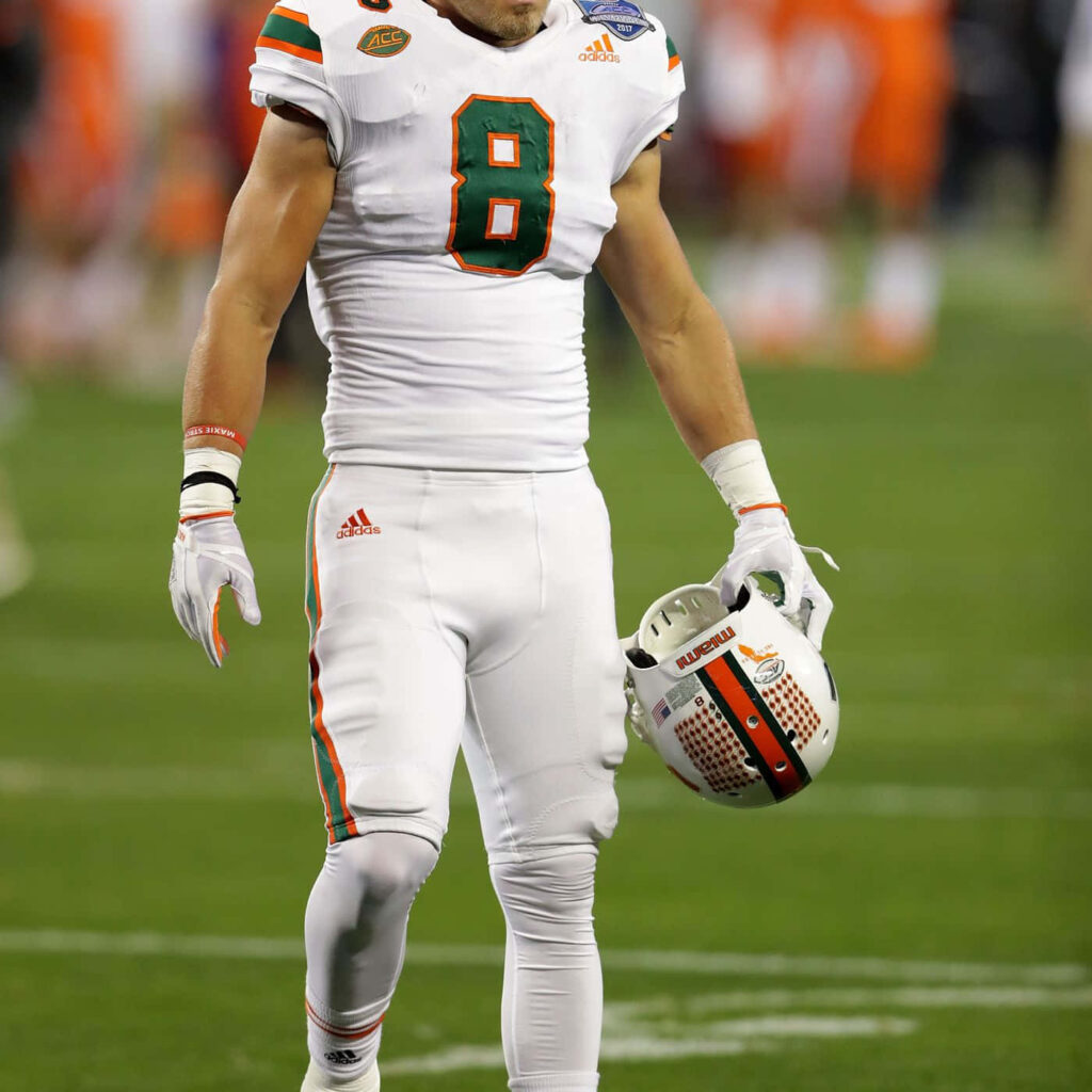 Braxton Berrios number 8 Miami Hurricanes football intense action high resolution wallpaper