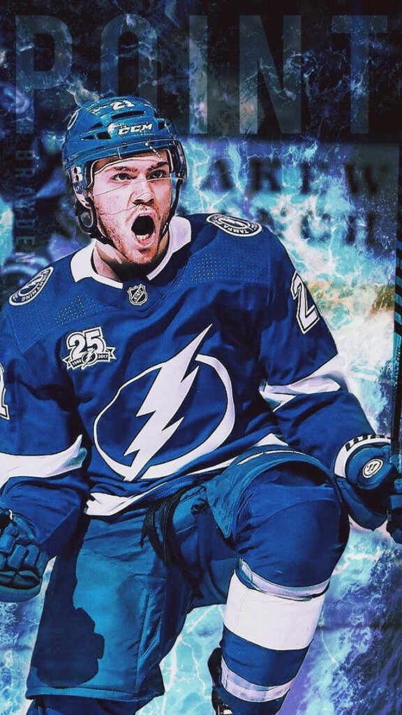 Brayden Point NHL star celebrating with fist pump wearing blue and white Lightning uniform on ice Wallpaper