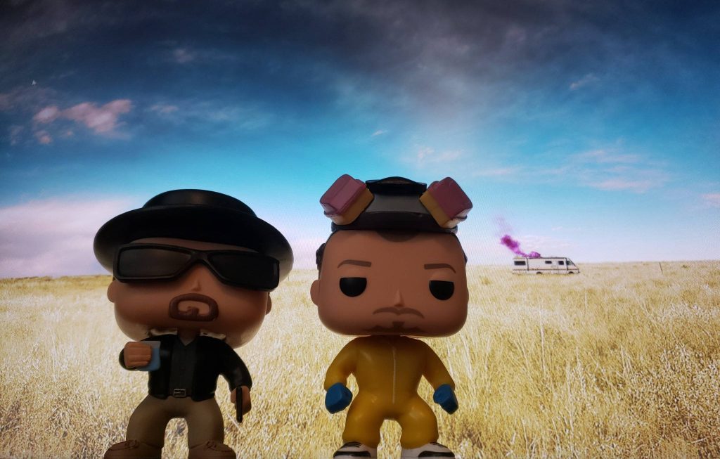 Funko Pop Breaking Bad Heisenberg and Jesse Pinkman with RV and purple smoke desert wallpaper