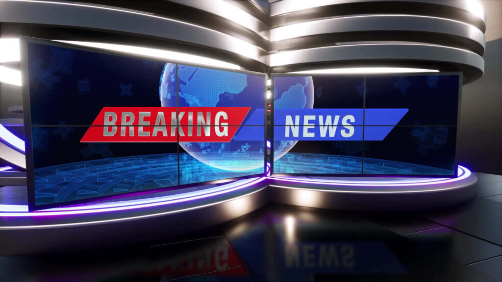Sleek CGI news studio with illuminated curved screens and bold breaking news graphics blue tones Wallpaper