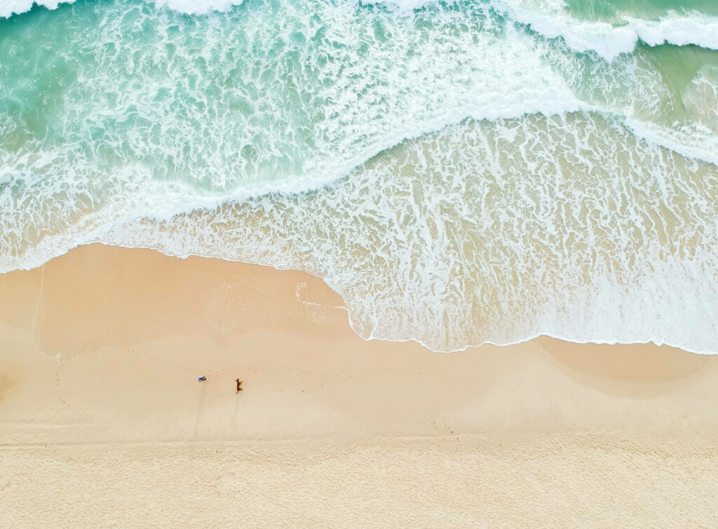 Stunning 4K Aerial Beach Wallpaper: Serene Summer Scene