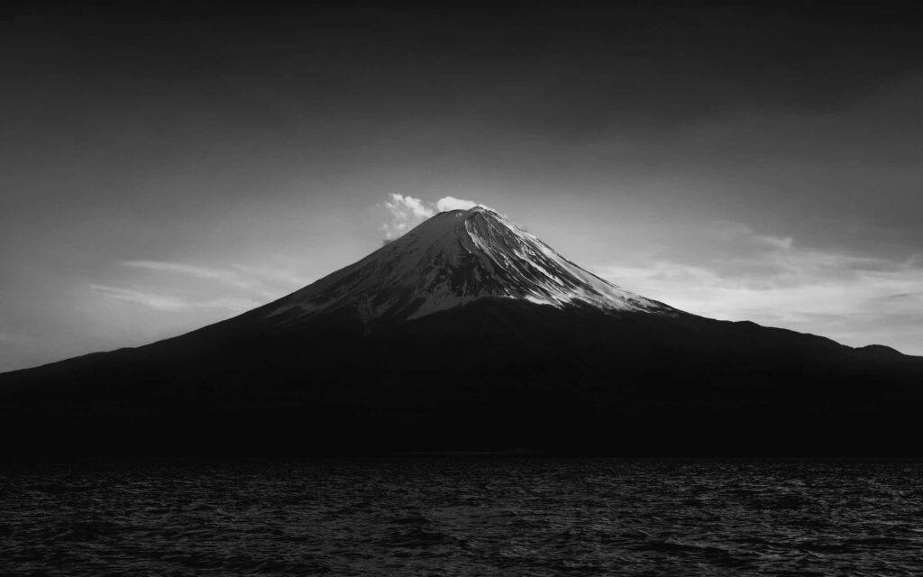 Aerial Serenity: Captivating Monochrome Snapshot Unveiling Japan's Mountain Wallpaper