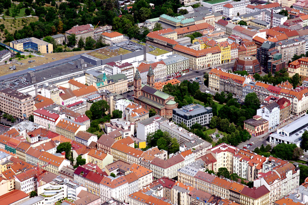 Stunning Aerial Wallpaper of Prague's Vibrant Architecture & Greenery