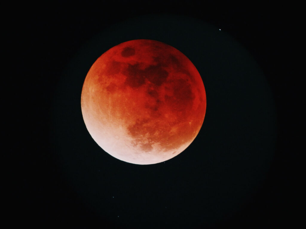 Breathtaking Alien Planet Wallpaper: Glowing Red Celestial View