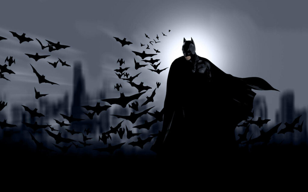 Dark Knight Rises: Batman in Batsuit Gazing into the Abyss, Enveloped by Bats - Incredible 4k Background Shot Wallpaper