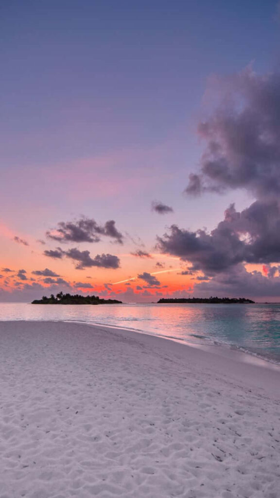 “Breathtaking Beach Sunset Wallpaper: Nature's Magic in Pink & Orange”