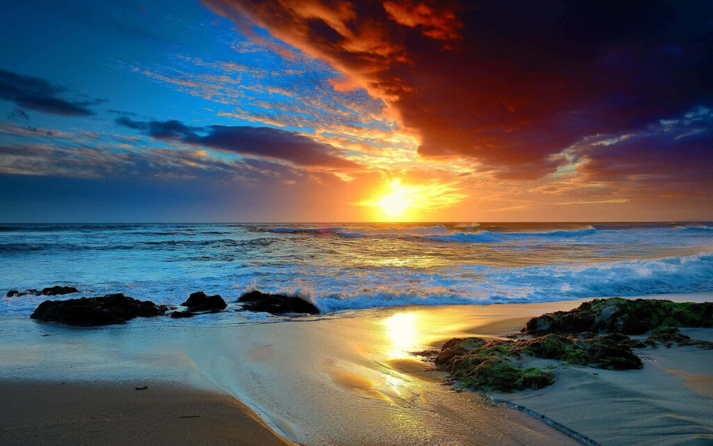 Vibrant Sunset Over Beach: Orange, Red & Blue Seascape Beauty Wallpaper