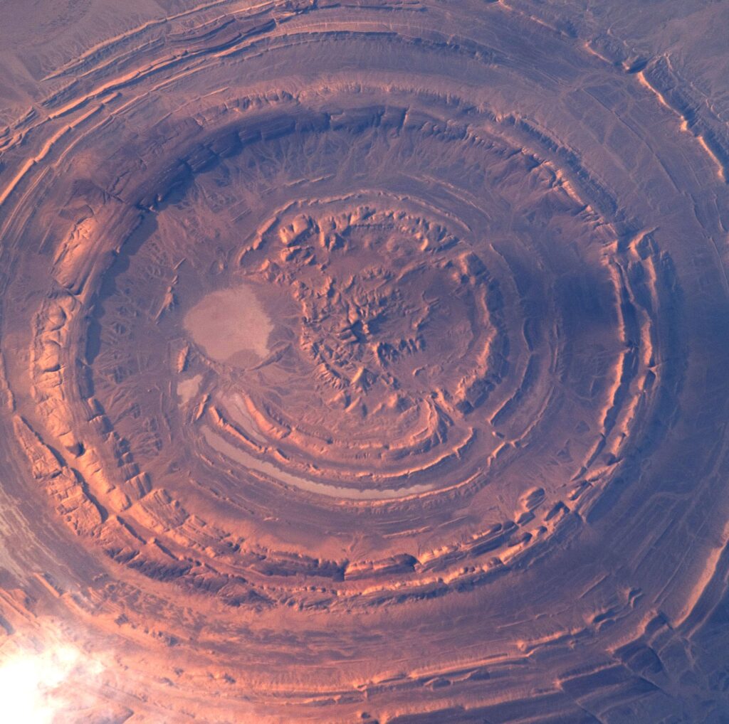 Breathtaking Circular Land Formation Wallpaper – Earth's Geological Beauty