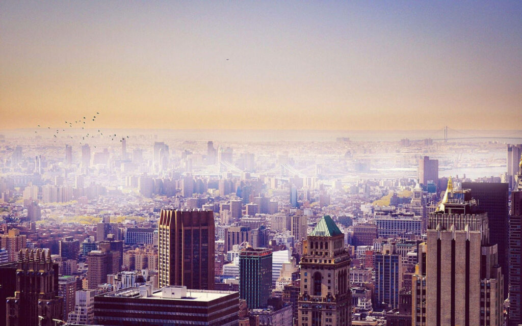 Breathtaking City Skyline at Dawn - Serene Wallpaper Background