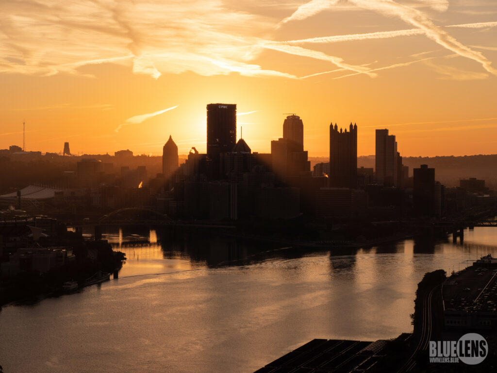 Breathtaking Cityscape Wallpaper: Dawn Reflections & Golden Hues