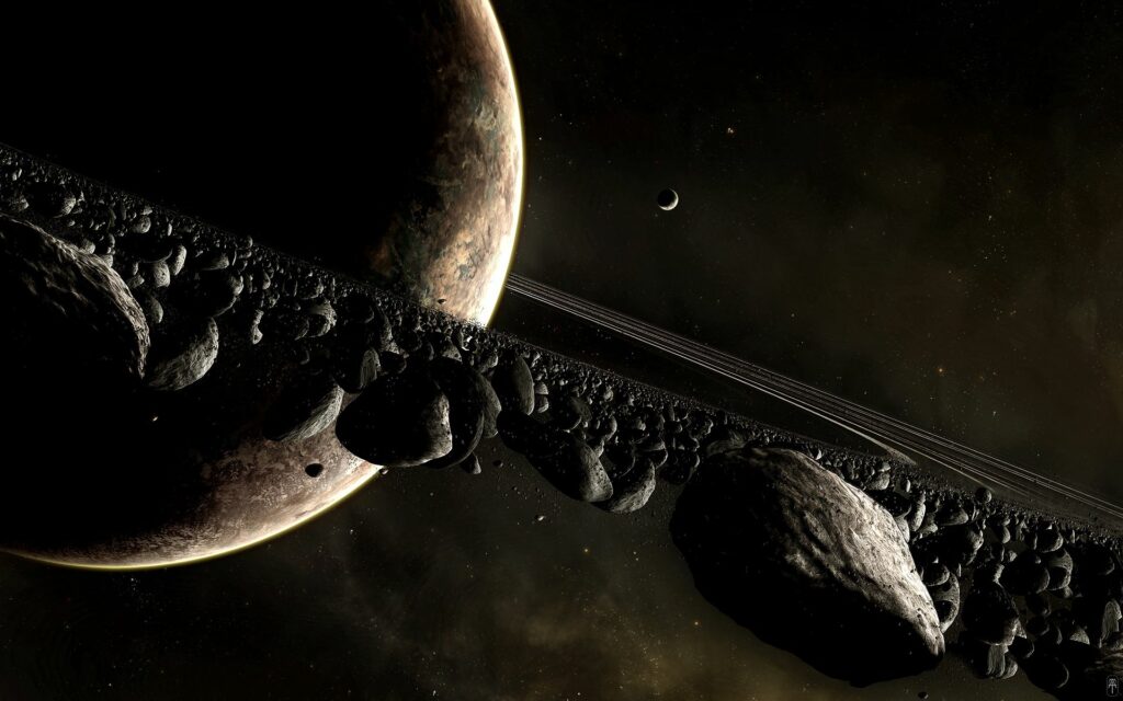 Breathtaking Cosmic Wallpaper: Ringed Planet & Asteroids in Space