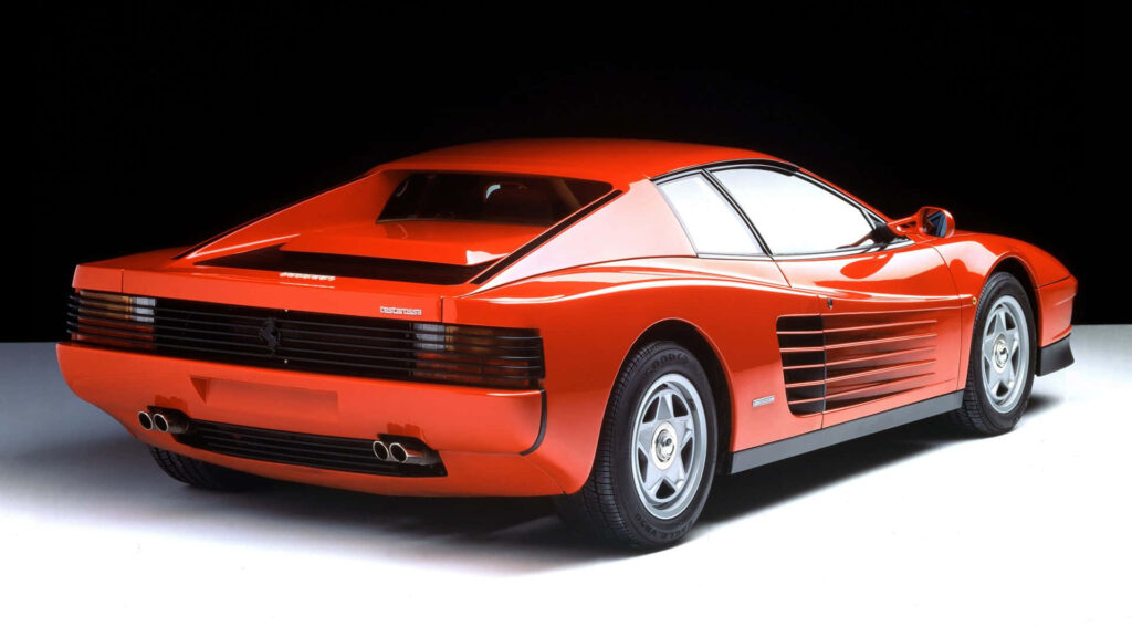 Breathtaking Detail: Immersing in the Timeless Beauty of a Red Ferrari Testarossa, Against a Stunning Backdrop Wallpaper