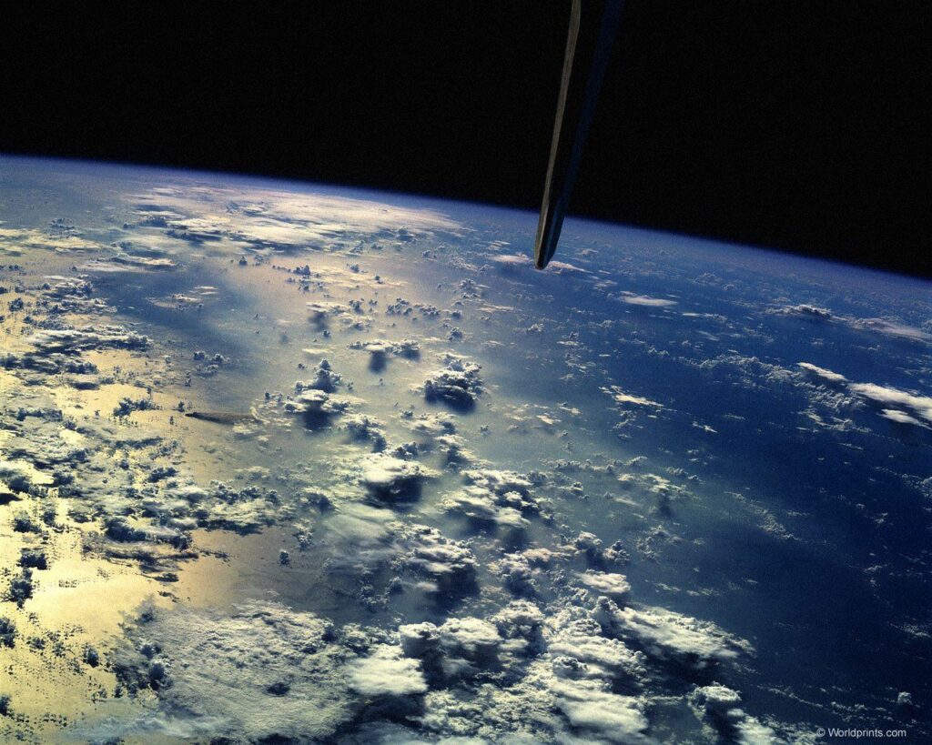 Stunning Earth Wallpaper: Serene View with Clouds & Ocean Reflections