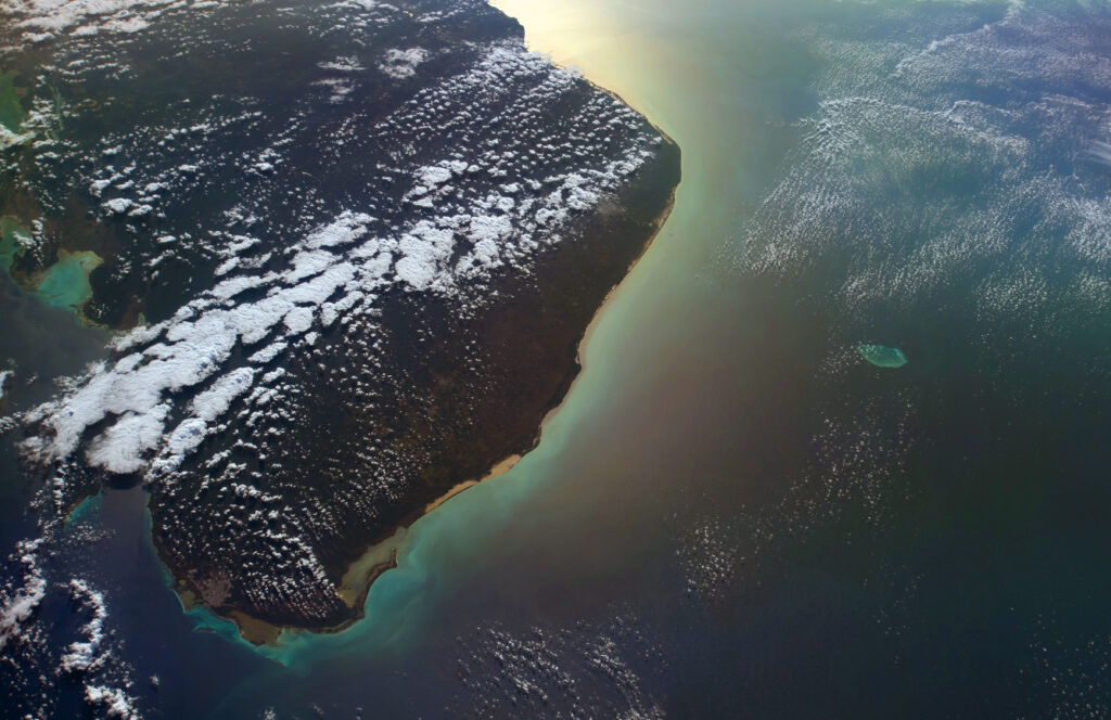 Stunning Earth Wallpaper: Serene Landmass & Celestial Beauty