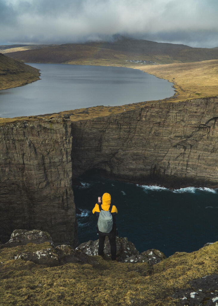 Stunning Faroe Islands Wallpaper: Cliffside Adventure & Natural Beauty