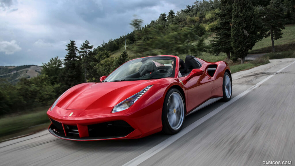 Unleashing Unrivaled Italian Supercar Power: The Exquisite Ferrari 488 Spider Roams the Serene Open Road Wallpaper