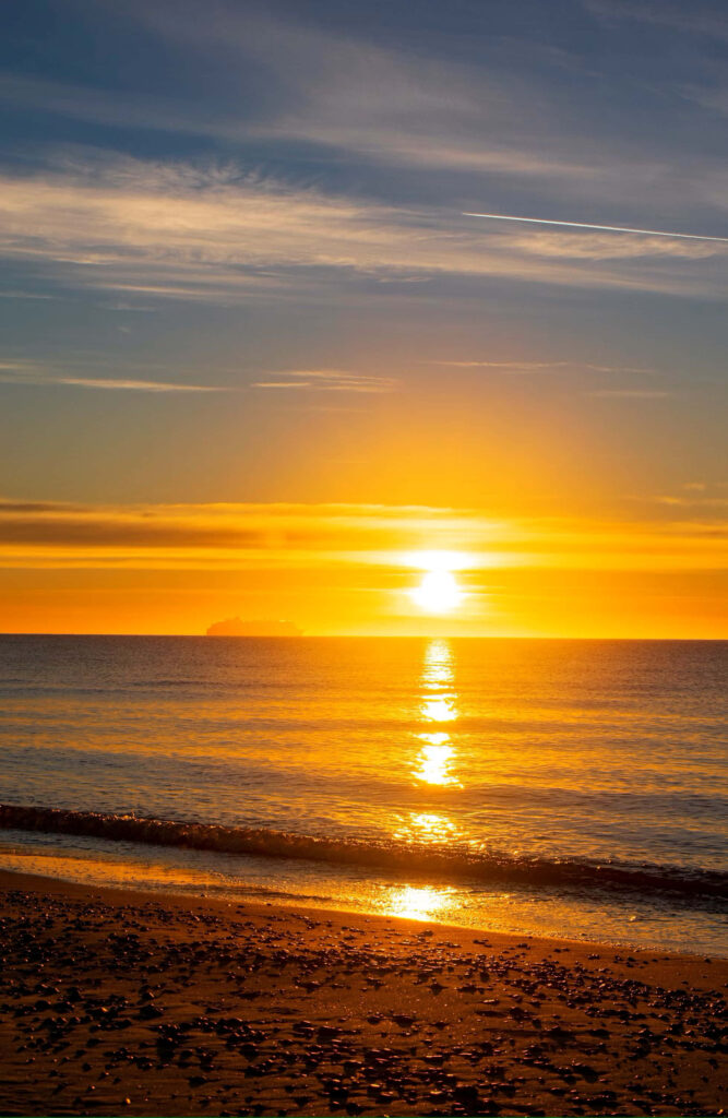 Stunning Golden Beach Sunset Wallpaper with Reflective Water