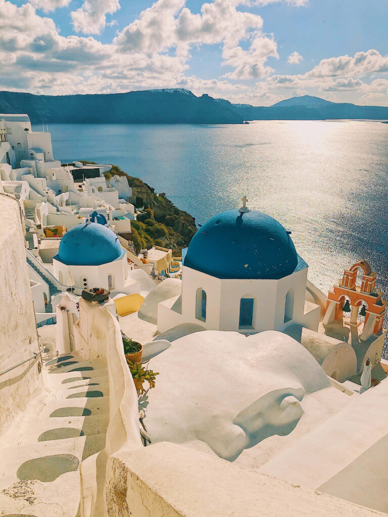 Breathtaking Greece Wallpaper: Iconic White Buildings & Serene Sea View