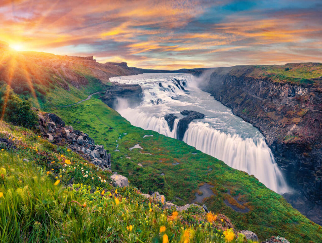 Breathtaking Gullfoss Waterfall Wallpaper at Stunning Sunrise