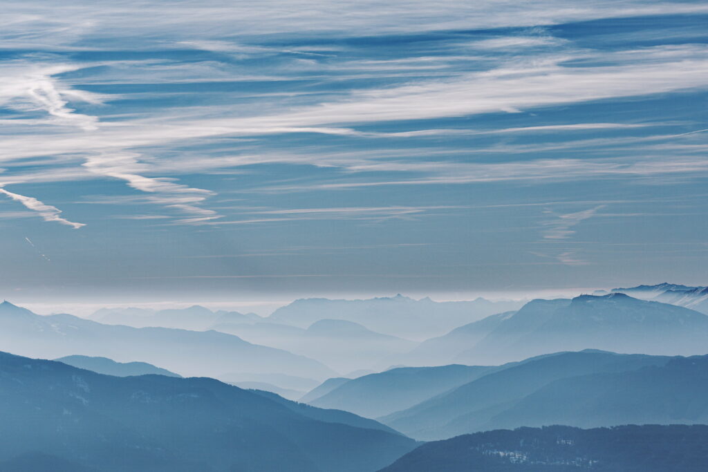 Breathtaking HD Mountain Landscape with Fog & Clouds - Background Wallpaper