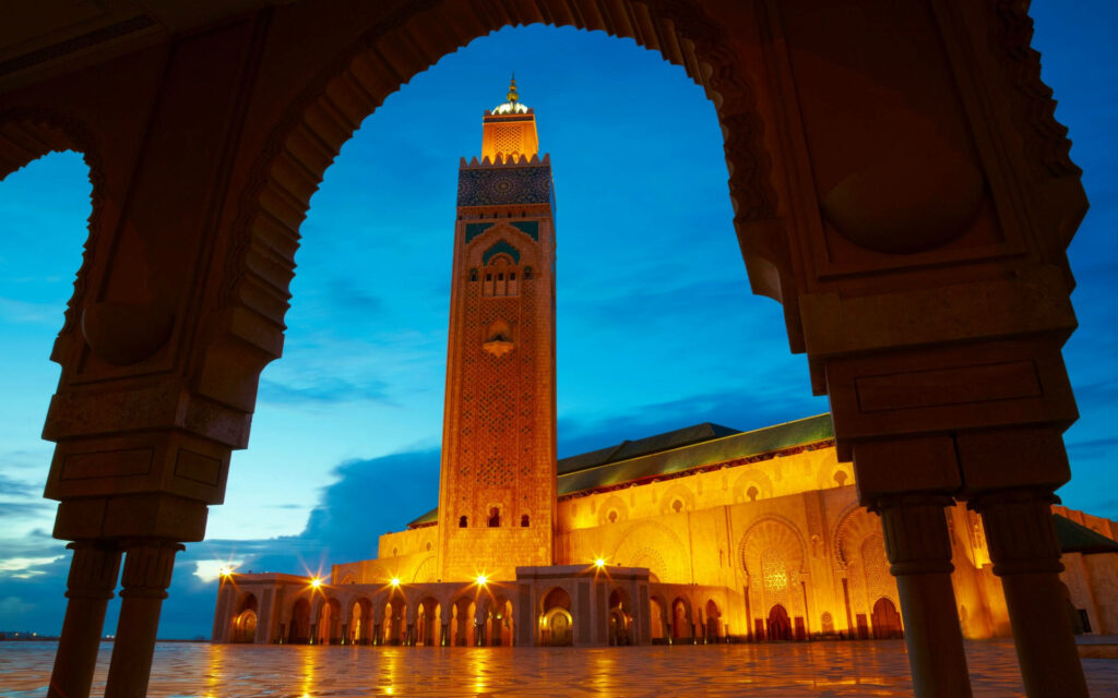 Breathtaking Hassan II Mosque at Dusk - Stunning Wallpaper Background