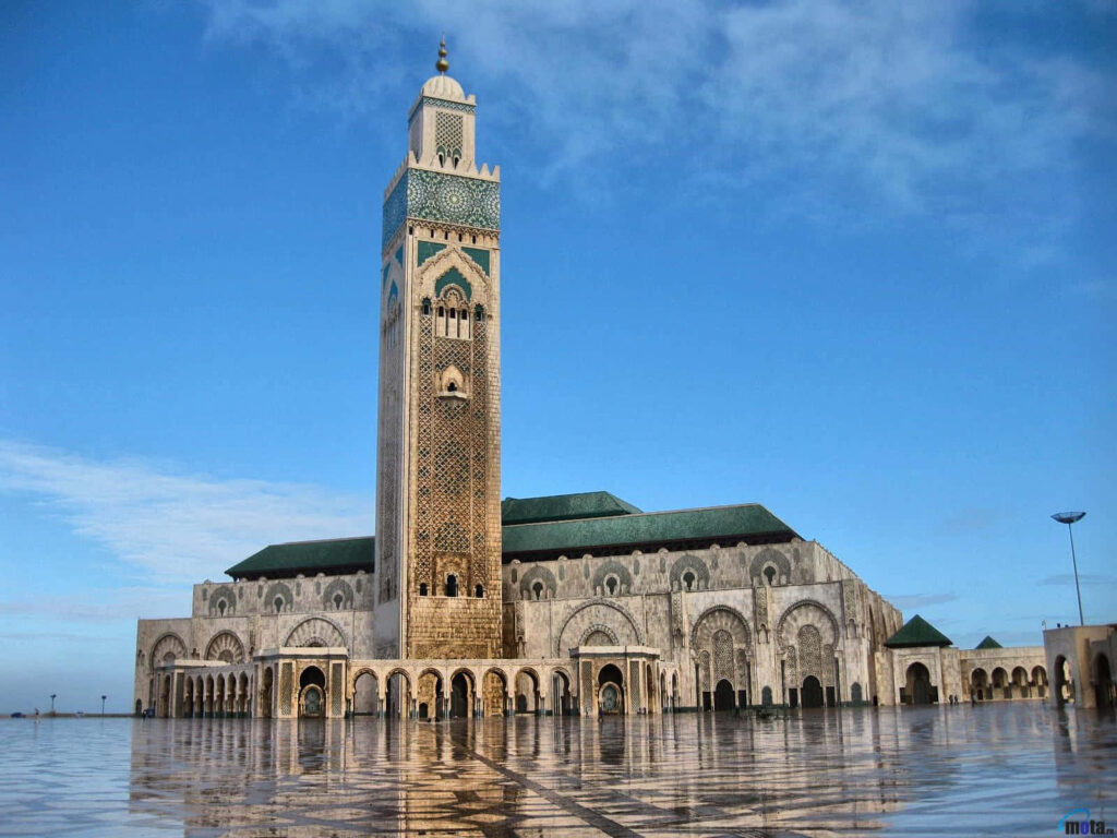 Breathtaking Hassan II Mosque Sunset: Serene Architectural Wallpaper