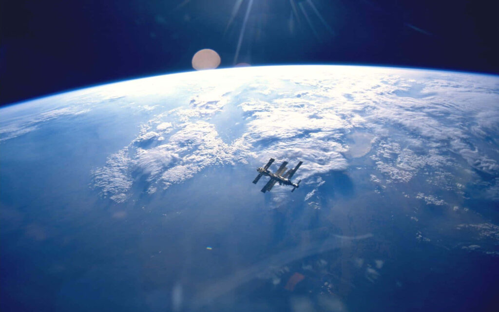 Stunning ISS Wallpaper: Earth’s Blue Atmosphere & Space Backdrop