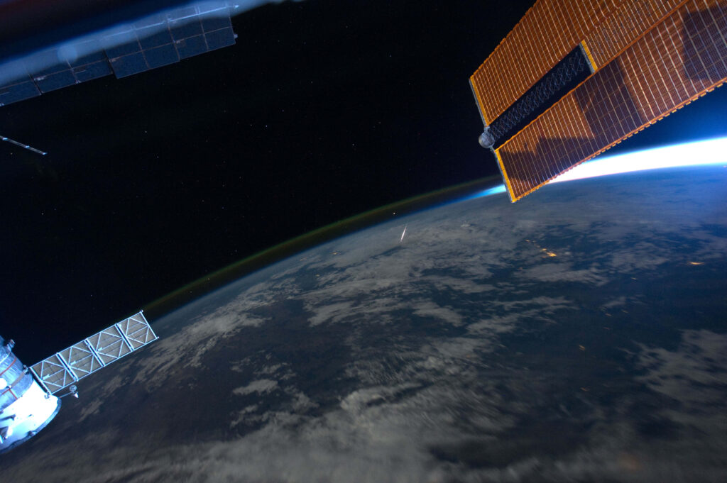 Breathtaking Wallpaper of ISS in Orbit with Earth & Space View