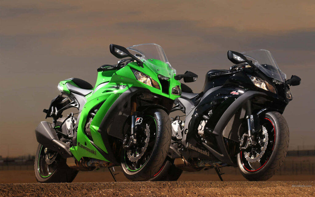 Stunning Kawasaki Motorcycles Wallpaper: Power & Design Under Dramatic Sky