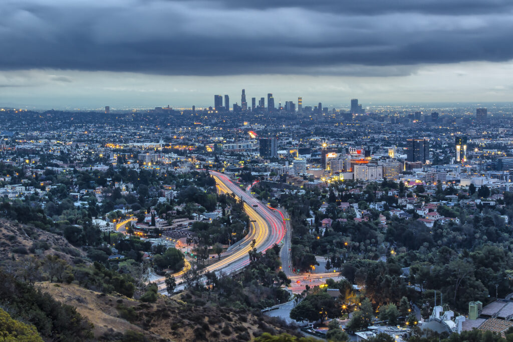 Breathtaking Los Angeles Wallpaper: Winding Road & Iconic Skyline