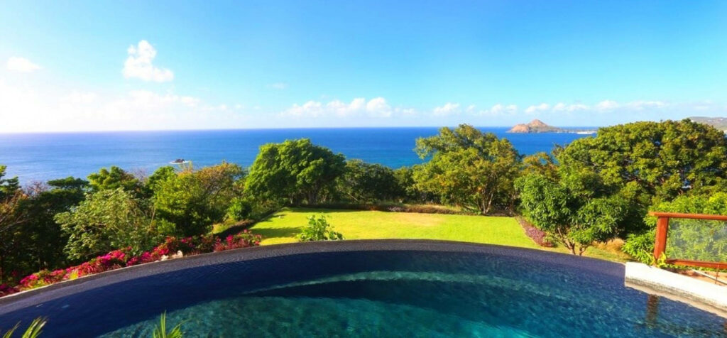 Breathtaking Morne Trulah Estate Wallpaper: Tranquil Pool & Caribbean Views