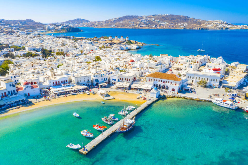 Stunning Mykonos Wallpaper: Vibrant Blue Waters & Whitewashed Buildings