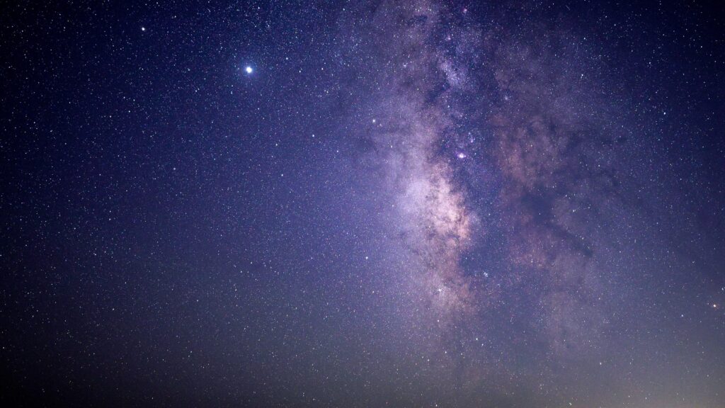 Stunning Nebula Wallpaper: Vibrant Starry Sky Background