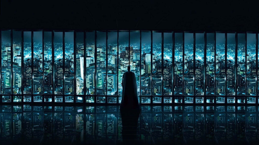 Breathtaking Night Cityscape Wallpaper: Person Enjoys Illuminated Skyline