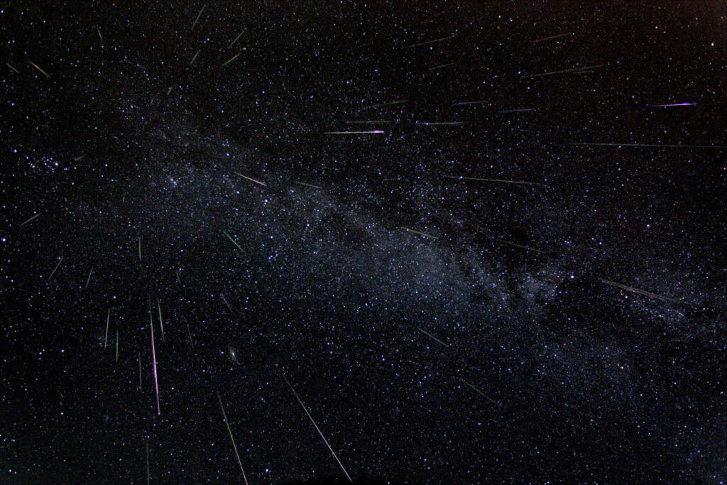 Breathtaking Meteor Shower Wallpaper: Starry Night Sky Background
