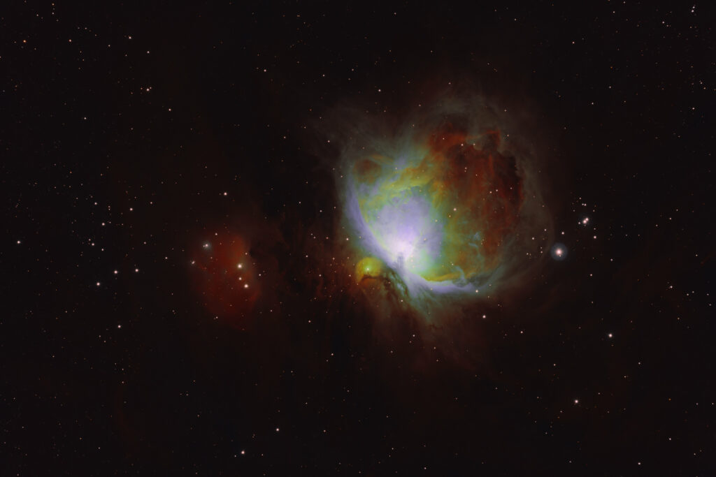 Stunning Orion Nebula Wallpaper: Vivid Space Background with Stars