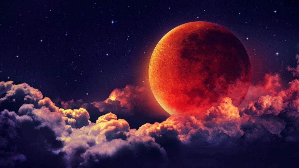 Vivid Red Moon Wallpaper: Intense Glow Over Starry Night Sky