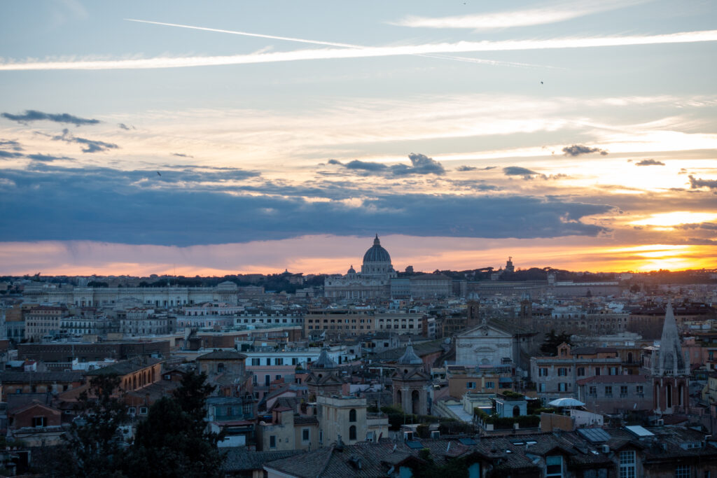 Stunning Sunrise Wallpaper of Rome's Iconic Skyline and Historic Charm